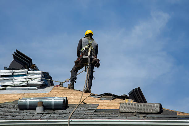 Professional Roof Replacement technician working in Andrews, TX
